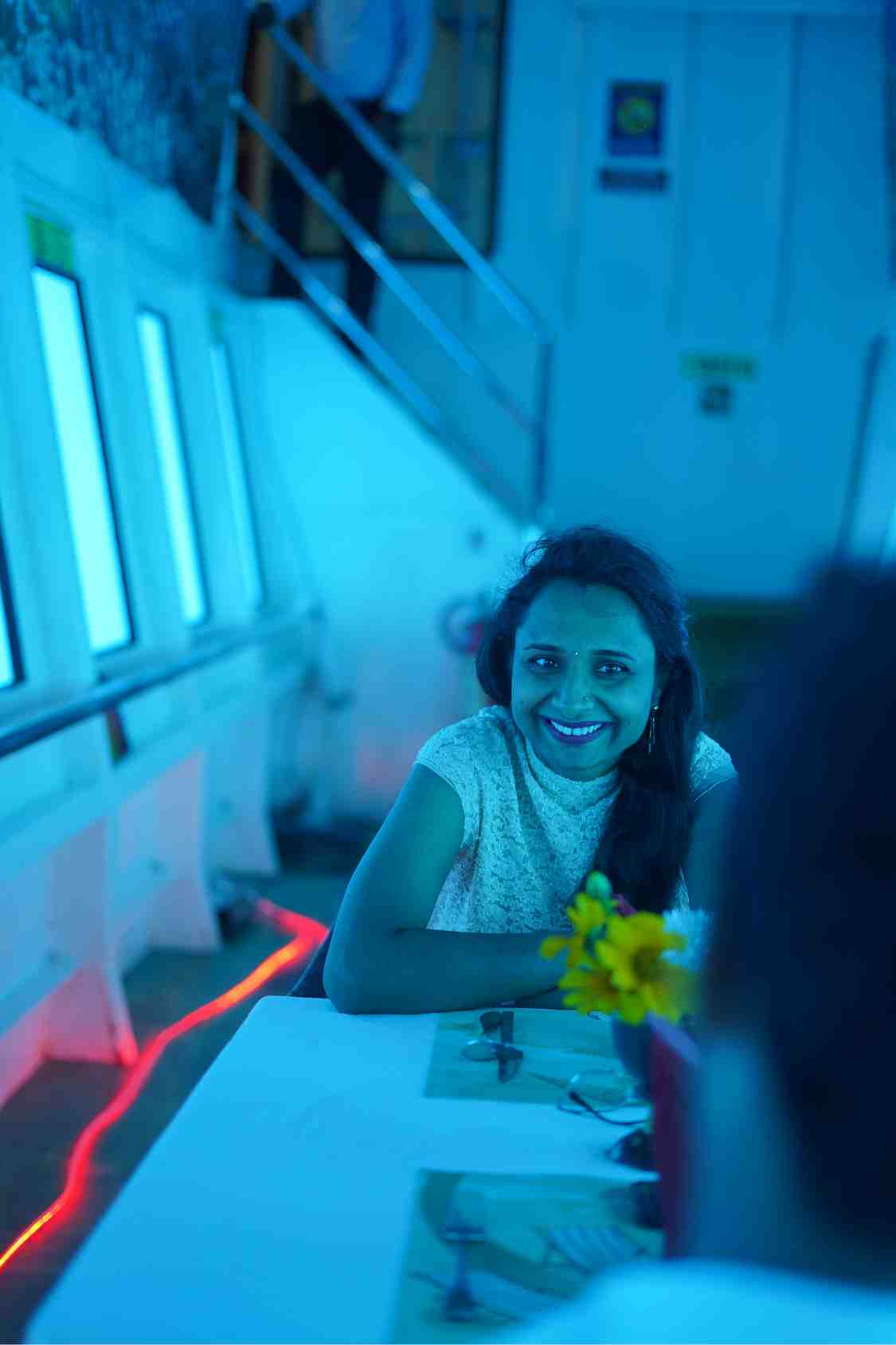 A guest smiling in the semi-submarine cabin