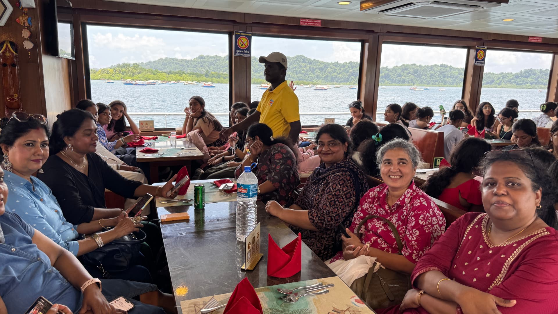 A full cabin of guests enjoying the lunch cruise