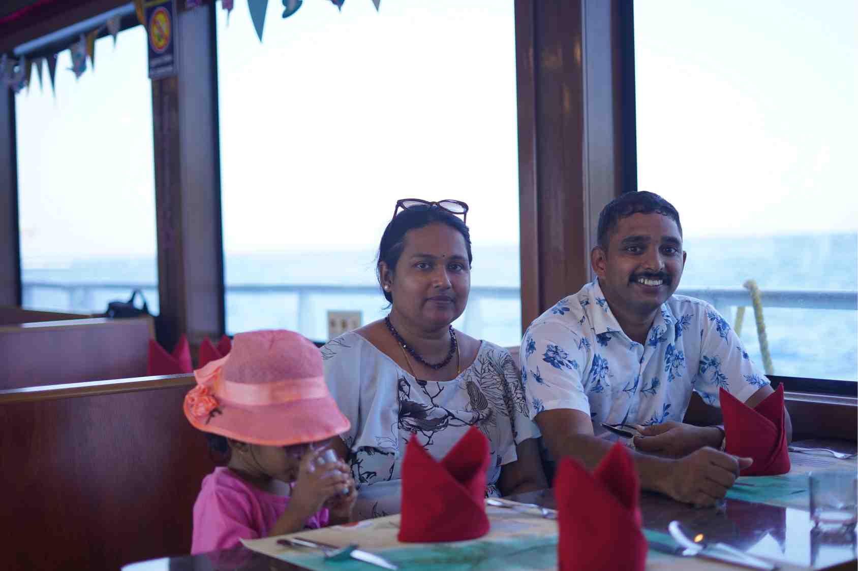 A family enjoying lunch on board during the cruise